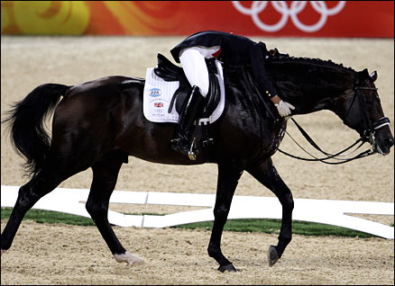 Emma Hindle hugs her horse after a great test