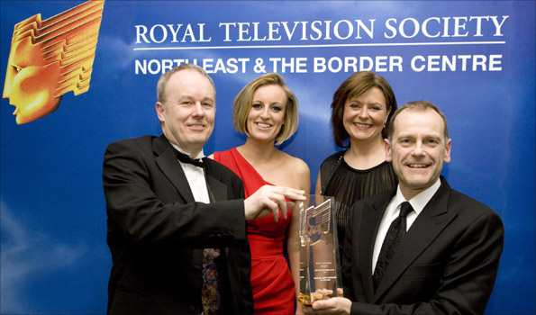 Best Regional News Programme Award - BBC Look North, Editor Andy Cooper and presenters Carol Malia & Jeff Brown pick up the trophy from BBC Breakfast Business presenter Stephanie McGovern