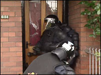 police raid a house