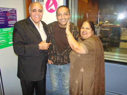 Sarbjit gives Adil a cheeky smack