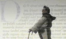 Statue of Saint David with some of his writings