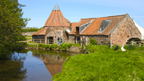View over millpond to Preston Mill at East Linton.