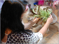 Liz Felix making a hat