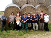 Archers in front of haystacks 203