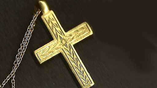 Margaret Hall talks about a cross made of Ethiopian gold.