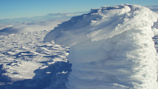 Thick windblown ice on a trig point