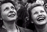 Photograph showing women celebrating VE Day, London, 1945