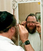 A Jewish man looks at himself in a mirror Image Credit: Unknown
