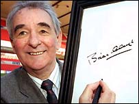 Brian Clough signs his name