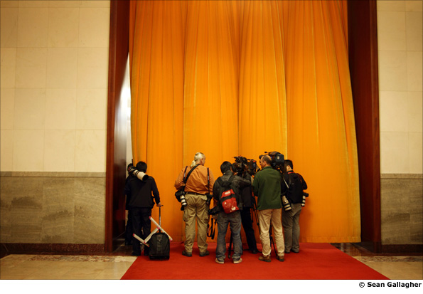 The press pack waits to be allowed into the meeting between British Prime Minister David Cameron and Chinese Premier, Wen Jiabao.