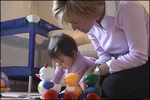 Jane and Abigail looking at a book
