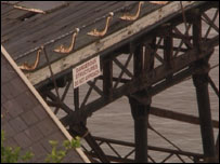 'Danger' sign on the pier walkway