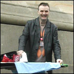 Paul Wappat ironing under Grey's Monument.