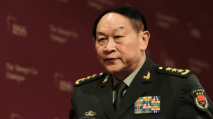 梁光烈在周日下午抵达印度孟买