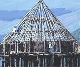 Image of roof being built with hazel rods