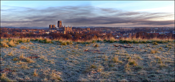 Black cloud drifting over Durham cathedral