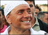 С.Берлусконі