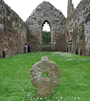 The chancel of Bonamargy Friary (People on left)