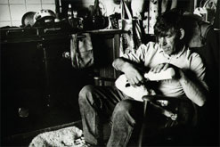 Image: Maureen McCracken's husband David in their kitchen at lambing time