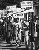 A picket line of African-American men and women demonstrates against segregation in South Chicago, Illinois