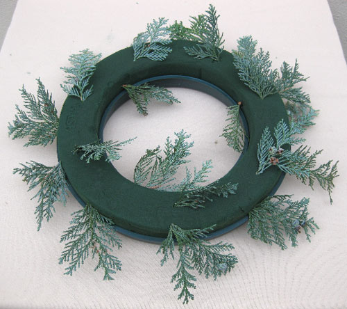 Add short snippets of conifer to the foam