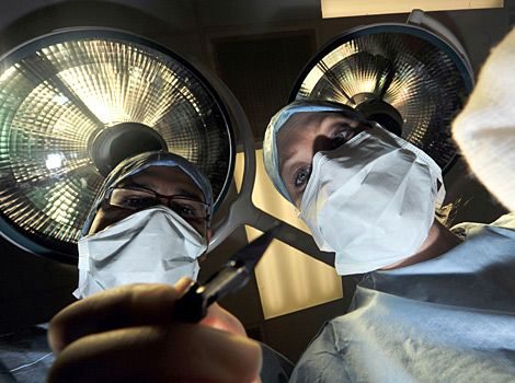 Surgeons performing an operation