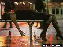 Woman passed out from drinking too much alcohol