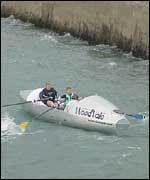 Commando Joe team members test an early version of the rowing boat