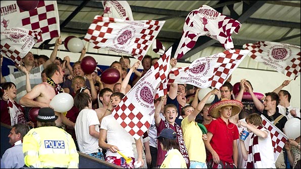 Linlithgow Rose fans celebrate the 2010 Scottish Junior Cup win over Largs Thistle