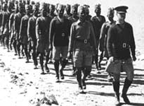 1st March 1940: Indian troops, led by British officers, march out of their desert camp in Egypt. The Indians were the first of the Empire troops to take up their station in the Middle East for the North African campaign.(Getty Images/Hulton|Archive)