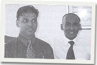 Moshin Ali, gweinydd y bwyty a Mohammed Khan, y rheolwr