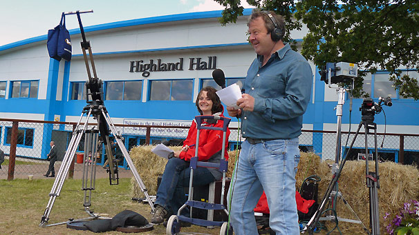 Helen Needham and Euan McIlwraith from the Out of Doors team record outside the Highland Hall.