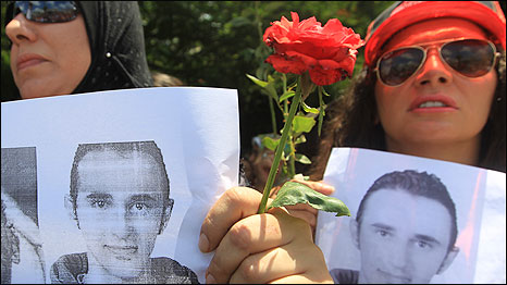 Egyptian women hold up pictures of Khaled Said during a demonstration in Alexandria on 25 June 2010. Photo: Khaled Desouki/AFP/Getty Images