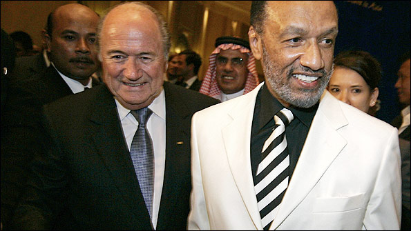 A controversial note passed to Mohamed Bin Hammam (right) could give England's bid fresh hope