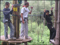 Laura making her way across the rope stirrups