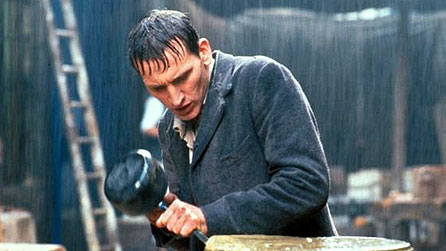 An actor portraying a young man at the beginning of the 20th century