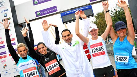 Dr Costas Karageorghis and runners at the end of a race.