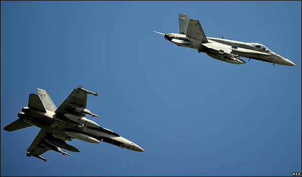 Canadian F18 jets landing in Sicily, 25 Mar 11