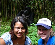 Becky with friend Heather with a silverback gorilla 