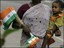 Indian woman selling national flags