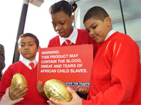 children with chocolate and banner