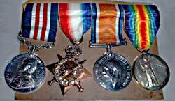 Left to right: Military Medal, Mons Star, Defence Medal and Victory Medal. Awarded to Samuel Craig.