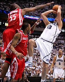 Dikembe Mutombo blocks another shot for the Houston Rockets
