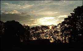 sun setting over ponte castle