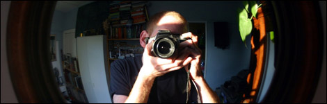 Man pointing a camera