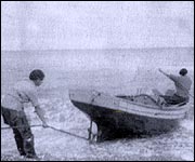Patience and Ella in their boat, circa 1920
