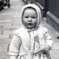 Valerie aged 12 months, outside her house