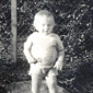 Maurice as a toddler in his back yard on the Larne Road, Ballymena, circa 1941