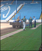 Ground staff lay new turf at Hillsborough