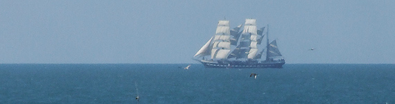 A tall ship on the horizon